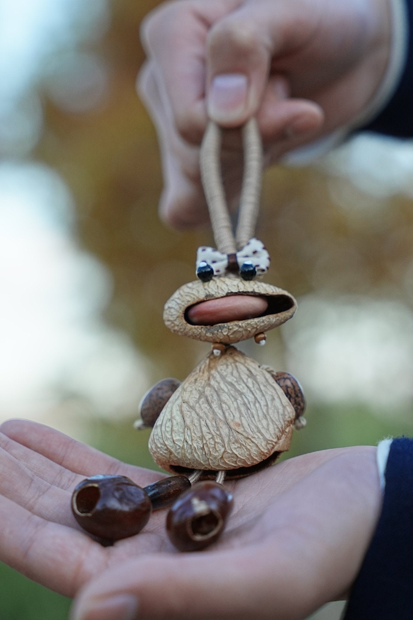 "The Polka Dot Monster" - Funny Big-Mouth Nut Shell Charm with Bow Tie